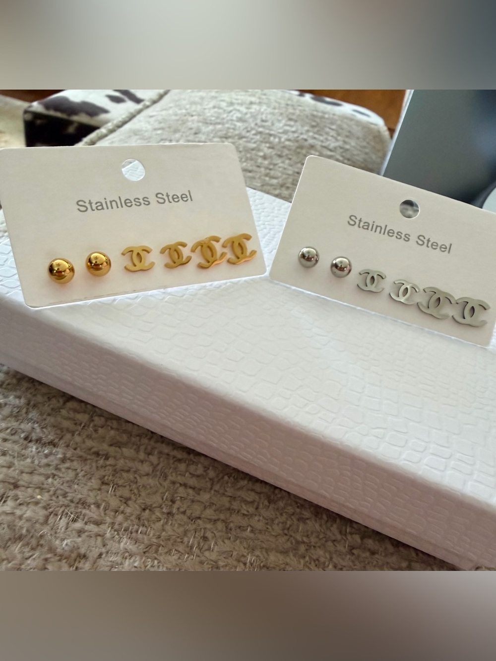 One gold & one silver tone set of post earrings, stainless steel (6 pc per set)